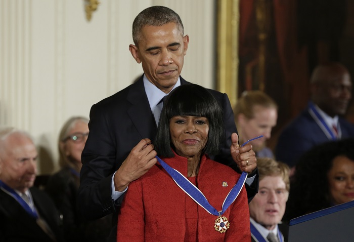 Former US president Barack Obama presenting the Presidential Medal of Freedom to actress Cicely Tyson during a ceremony in the White House East Room in Washington on November 22 2016.