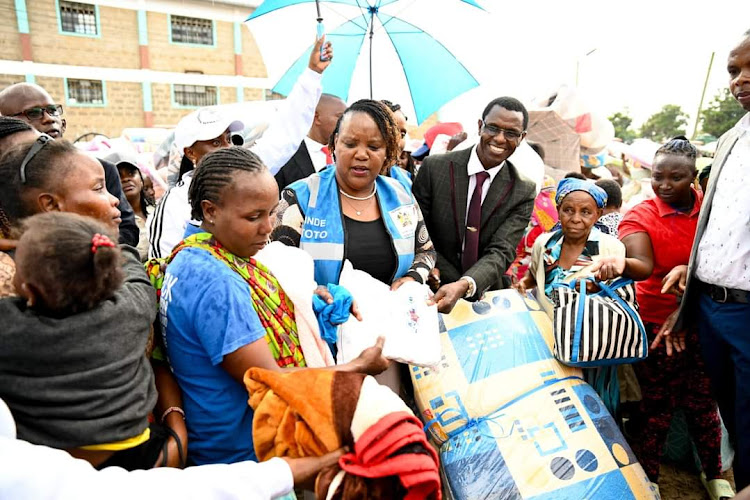 Cabinet Secretary Ministry of Labour and Social Protection Florence Bore during distribution of essential household items to people affected by heavy floods in Githurai Nairobi on May 17, 2024