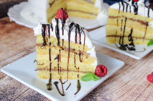 A slice of Italian Liqueur Cake on a plate.