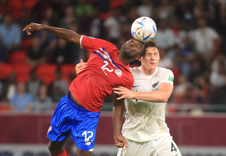 Costa Rica's Joel Campbell in action with New Zealand's Nando Pijnaker/Mohammed Dabbous