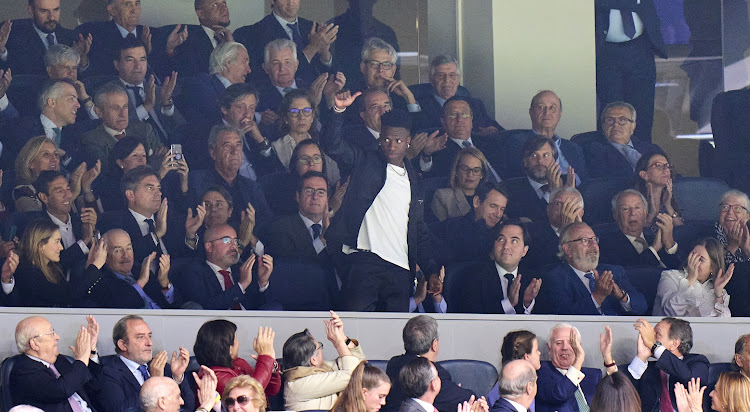 Vinicius Junior of Real Madrid acknowledges applause from the crowd during the LaLiga Santander match between Real Madrid CF and Rayo Vallecano at Estadio Santiago Bernabeu in Madrid on May 24 2023.