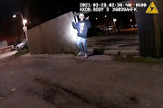 Adam Toledo, 13, holds up his hands a split second before he was shot by police in Little Village, a neighbourhood on the West Side of Chicago, Illinois, US March 29 2021 in a still image from police body camera video. 