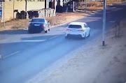 In a video doing the rounds on social media, a person travelling in a black Mercedes-Benz can be seen trying to get away from the occupants of a white BMW 1 Series.  