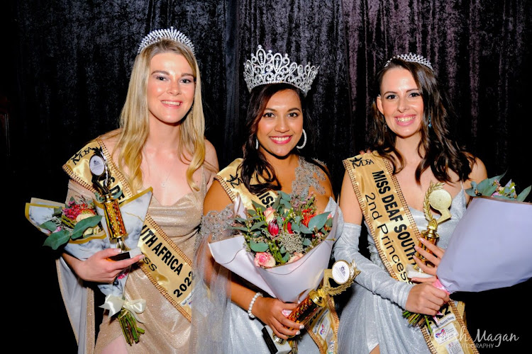 Logan Raasch, left, is crowned first princess at the Miss Deaf SA pageant in Durban on Saturday. With her are winner Kereese Kuppan, centre, and second princess Sasha Cochran