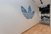 The adidas logo in the new store is made from reclaimed plastics.