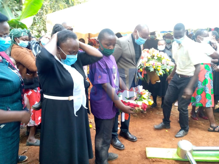 Relatives break in tears as they lay to rest their only remaining grandmother Gladys Embu.