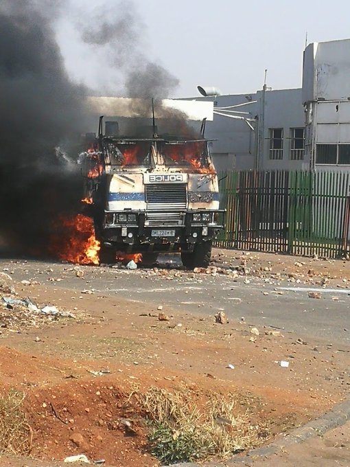 An armoured police car was petrol bombed in Soweto