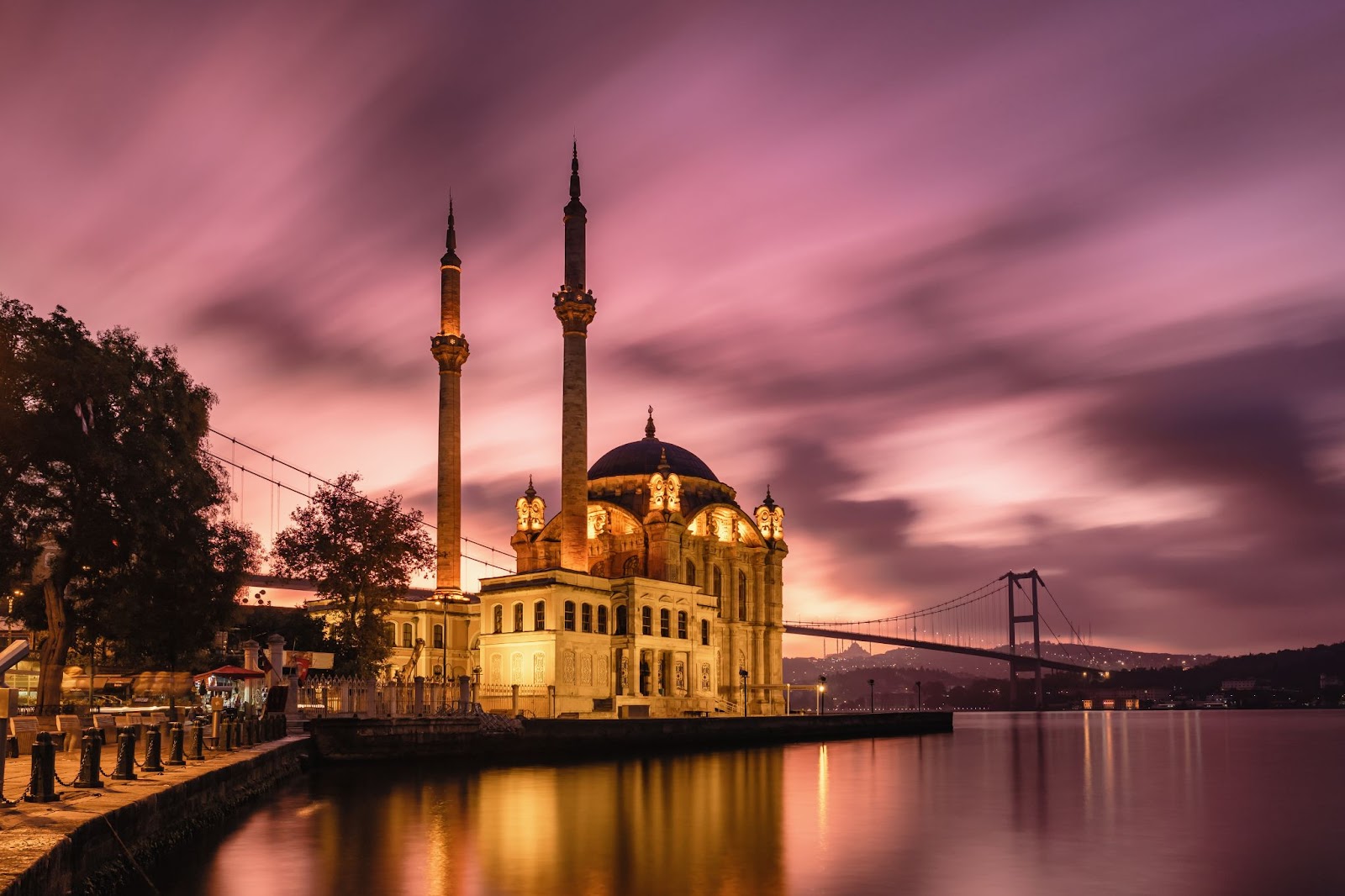 Ortakoy mosque and Bosphorus bridge with an amazing sunrise sky at background, Istanbul, Turkey. Best Tourist Attraction in Istanbul