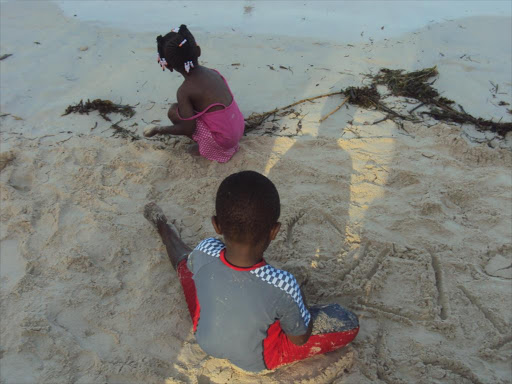 A file photo of children playing at the beach in Malindi. /ALPHONCE GARI