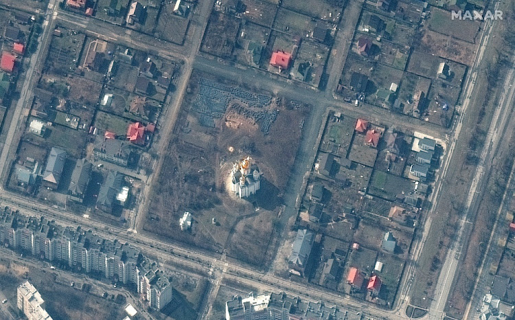 Overview of probable grave site and Church of St Andrew and Pyervozvannoho in Bucha, Ukraine on March 31 2022. Picture: Satellite image ©2022 Maxar Technologies