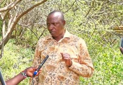 Baringo Beekeepers and Honey Producers Association chairman Justine Chebii addressing media in Marigat town on Saturday.