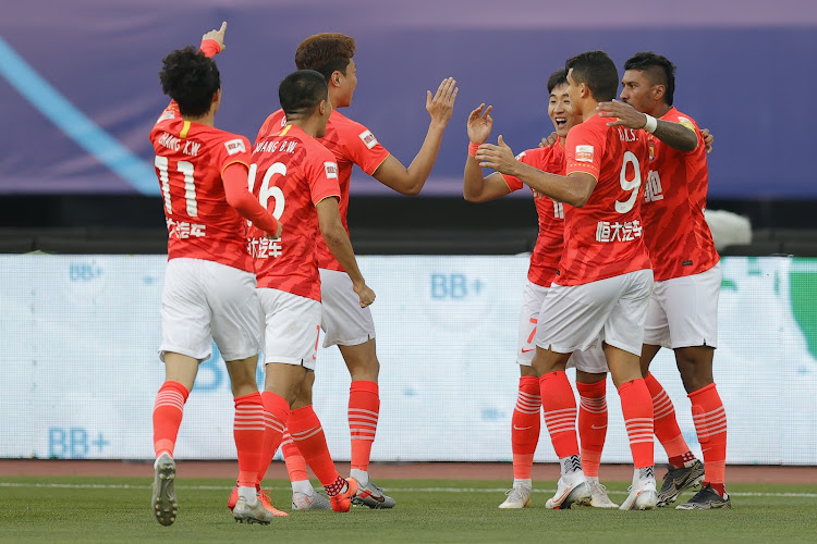 Wei Shihao of Guangzhou Evergrande celebrates after scoring his team's goa.