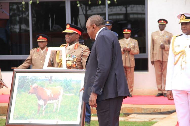 President Uhuru Kenyatta receiving gifts during his farewell ceremony on September 9, 2022.