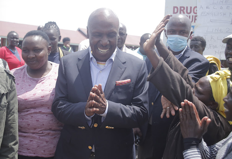 Baringo Senator Gideon Moi smiles s he inspects voting at Kaptimbor polling station, Baringo Central, on Tuesday, August 9.