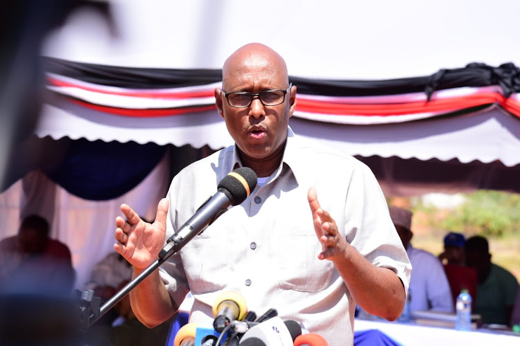 The CS for East African Community & Regional Development Adan Mohamed speaking during the commissioning of the factory in Wajir.