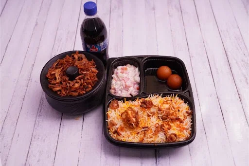 Veg Biryani + Thums Up (250 ml) + Dessert