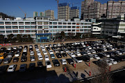 South Korean Christians from the Seoul City Church gather worship from their car at a drive-in Christmas service as South Koreans take measures to protect themselves against the spread of coronavirus (Covid-19) on December 20, 2020 in Seoul, South Korea. 