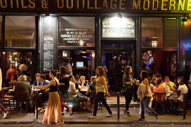 A bustling café on Rue Oberkampf in Paris.