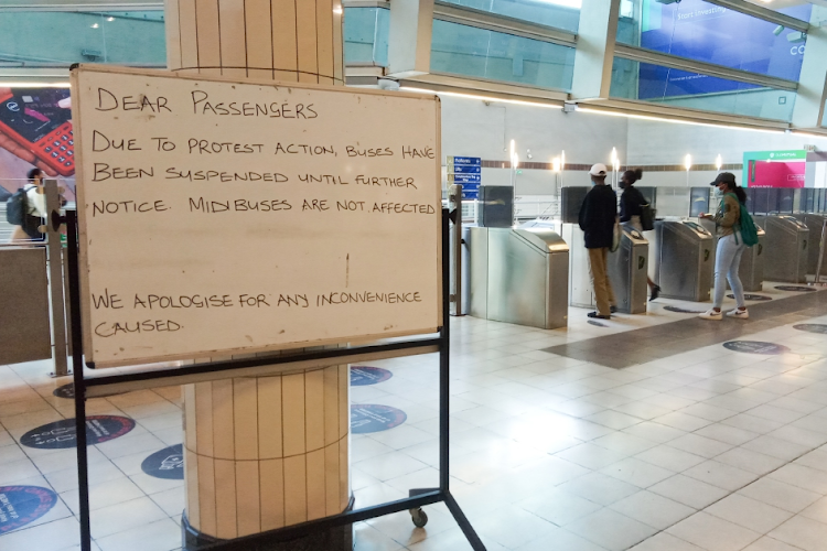 A signboard stating the suspension of buses at the Gautrain station in Sandton on March 8 2022.