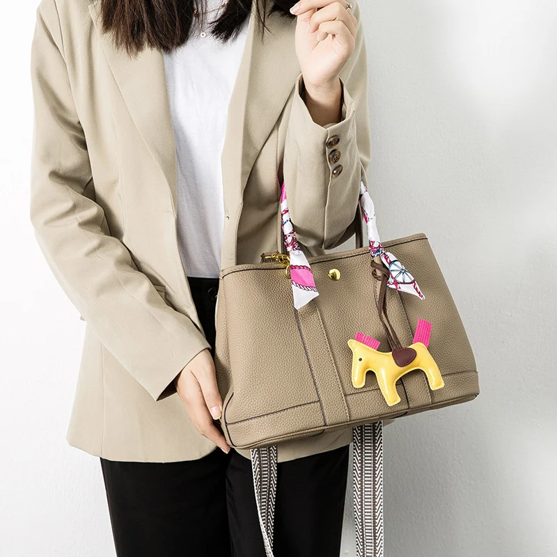 Large Capacity Cross Body Bucket Bag featuring a Wide Shoulder Strap, designed for comfortable everyday use, carrying al
