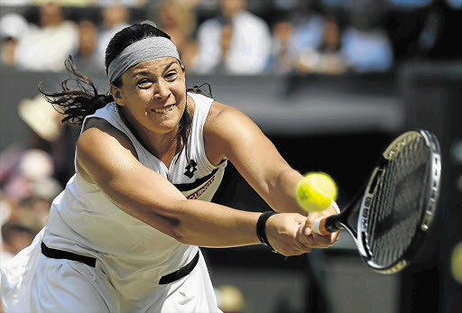 Wimbledon 2013 women's champion Marion Bartoli. Critics of Bartoli tweeted immediately after the women's final that she was a 'fat pig' and 'ugly'