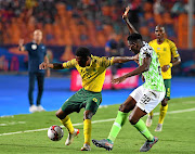 Bafana's Lebo Mothiba tries to dribble past Nigeria's Kenneth Omeruo during the Afcon quarter-final match in Egypt. 