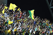 Mamelodi Sundowns supporters in a stadium before Covid-19. Sascoc will recommend to government that stadiums host matches at half their capacity. 