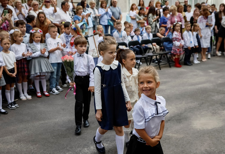 First graders attend a ceremony to mark the start of the new school year, amid Russia's attack on Ukraine, in Kyiv, Ukraine on September 1 2023. Picture: REUTERS/Gleb Garanich