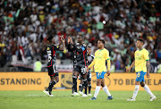 Orlando Pirates celebrate being the champions of the 2023 MTN8 final after beating Mamelodi Sundowns at Moses Mabhida Stadium in Durban. 