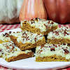 Thumbnail For A Stack Of Pumpkin Cream Cheese Bars On A White Plate.