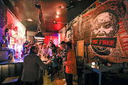 Patrons enjoy a drink in a pub in Melville, Johannesburg. The National Liquor Traders Council has welcomed the government’s decision not to place any restrictions on the sale of alcohol outside of curfew hours.