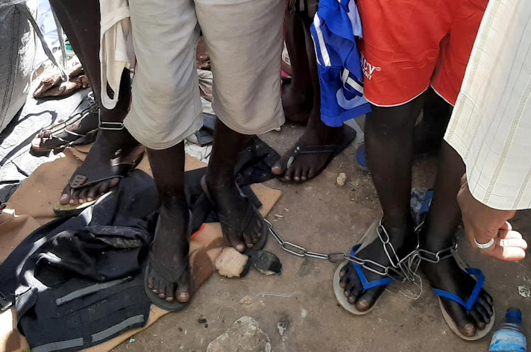 People with chained legs are pictured after being rescued by police in Sabon Garin, in Daura local government area of Katsina state, Nigeria October 14, 2019. REUTERS/Stringer