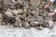 Restorers works on an archeological site on February 6, 2013 in Pompeii. An ambitious restoration project dubbed 