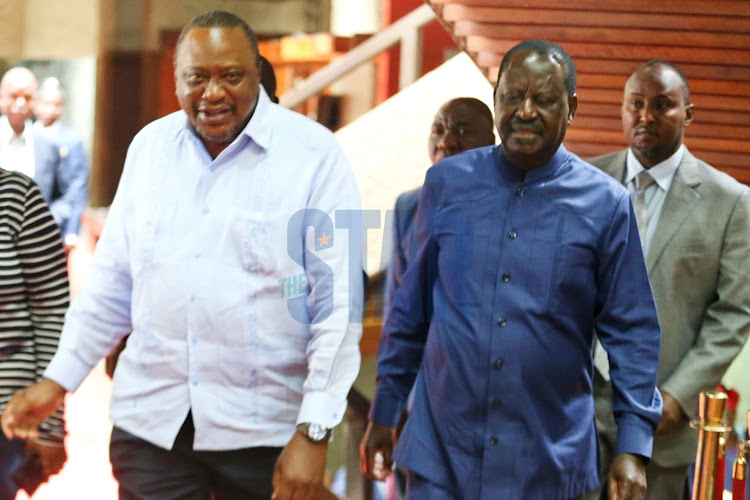 President Uhuru Kenyatta and ODM party leader Raila Odinga arrive at KICC on April 21, 2022.