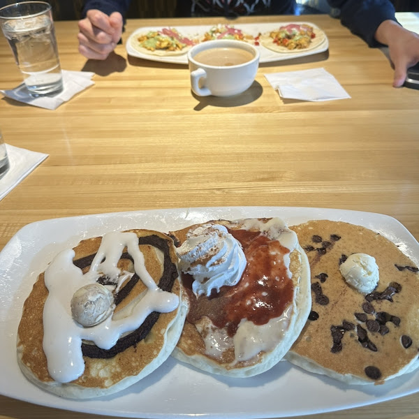 Pancake flight! Breakfast tacos at the top of the pic, which can be modified GF.