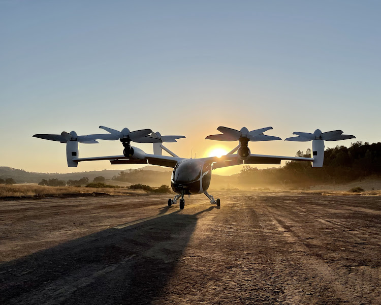 The Joby sky taxi looks a lot like a helicopter and is able to take off and land vertically.