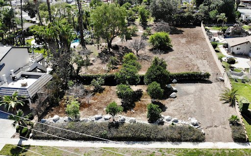 Cleared land with trees and vegetation in this luxury land for sale in Corona ($599,000)