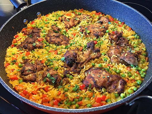 This one-pot Puerto Rican recipe called Arroz con Pollo is so delicious!