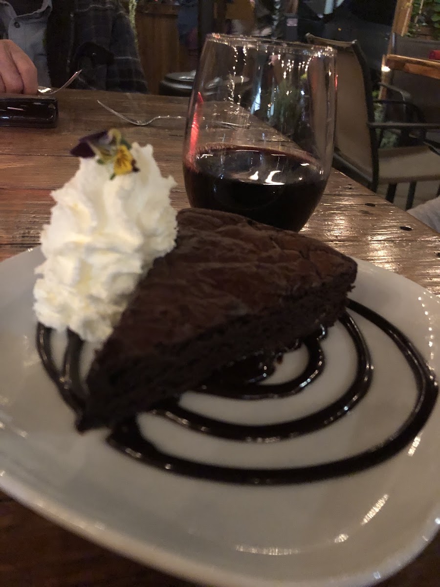 Brownie with fresh whipped cream and wine so amazing!