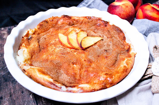 Peaches and Cream cake ready to be sliced.