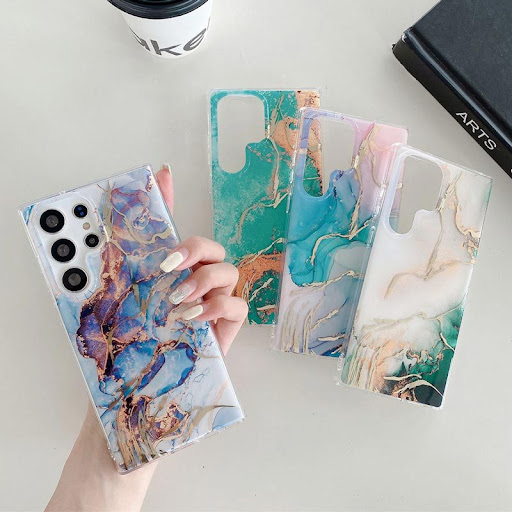Title 3, Glass Gold Sand Marble Phone Case. Provides sty...