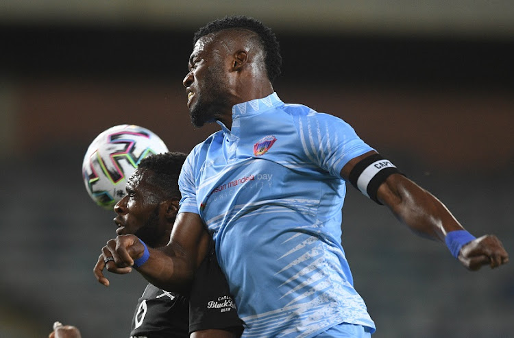 Fortune Makaringe of Orlando Pirates challenges Augustine Kwem of Chippa United during the DStv Premiership match between Orlando Pirates and Chippa United at Orlando Stadium on December 16, 2020 in Soweto, South Africa.