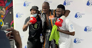 Khensamahosi Makondo is flanked by trainers Nyiko Ndukula, left and Hloni Maboko. 