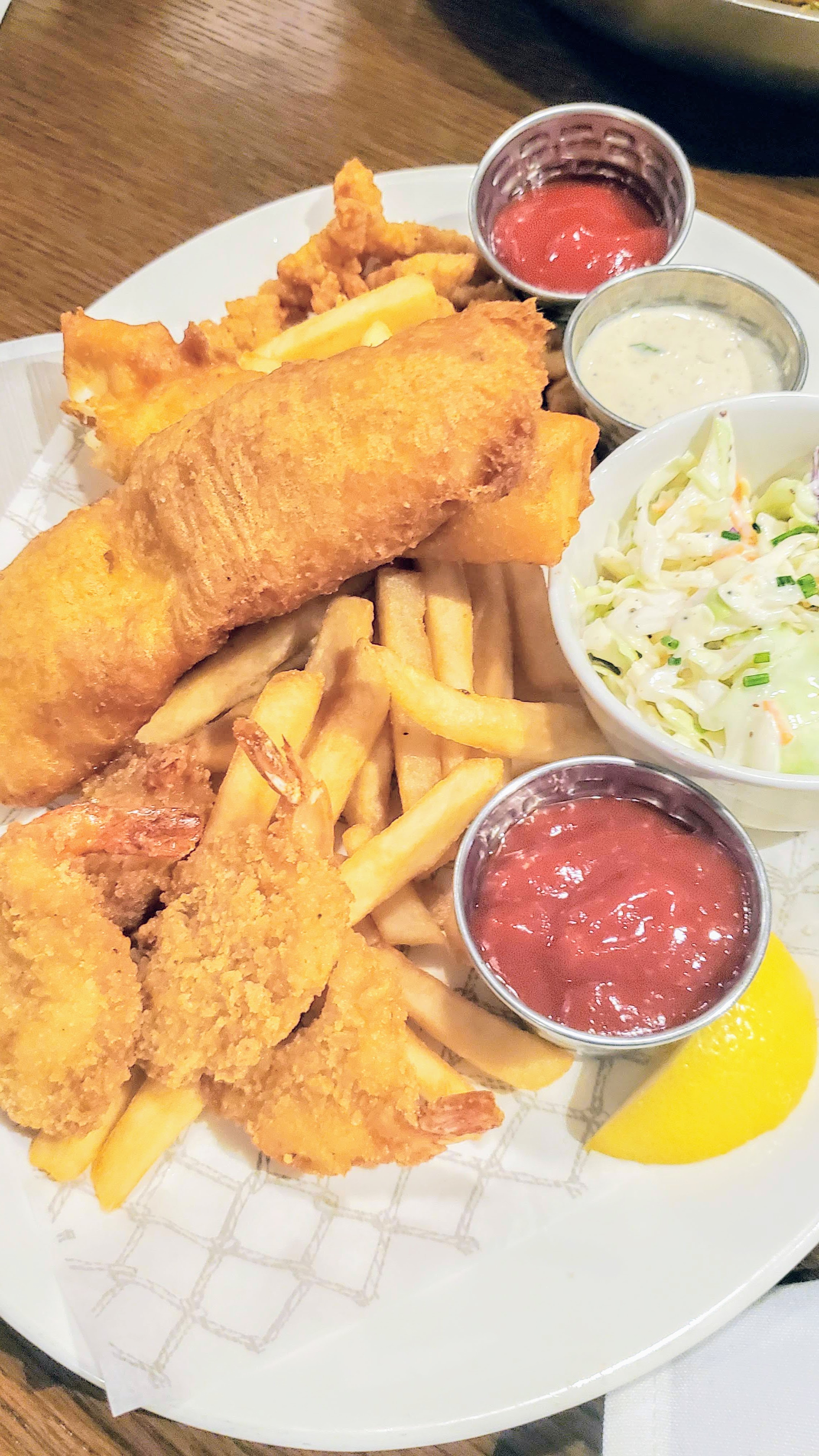 Line and Lure Captain's Plate which uses that Great Lure Kolsch beer batter with rockfish, pacific cod, breaded clams strips, panko prawns, house-made tartar sauce, chipotle-lemon cocktail sauce, fresh coleslaw