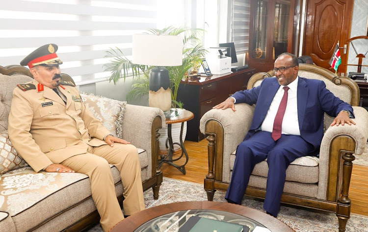 Islamic Military Counter Terrorism Coalition (IMCTC) Secretary General Major General Mohammed Bin Saeed Al- Moghedi and Cabinet Secretary for Defence Aden Duale at the Defence Headquarters in Nairobi on May 30.