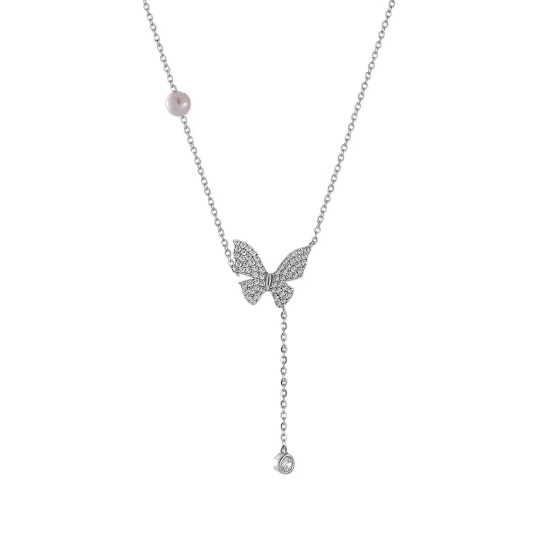 Vlinder sleutelbeenketting voor dames van topkwaliteit. Verfraai uw look met deze elegante ketting, perfect om uw outfit te accentueren en uw decolleté te benadrukken.