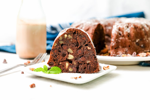 A slice of Double Chocolate Rum Cake on a plate.