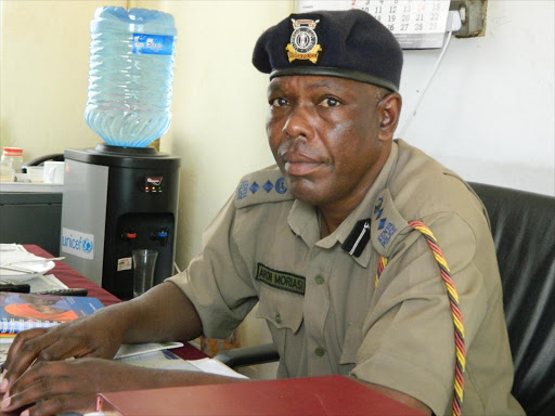 Garissa police boss Aron Moriasi addresses the press in his offi ce yesterday /STEPHEN ASTARIKO