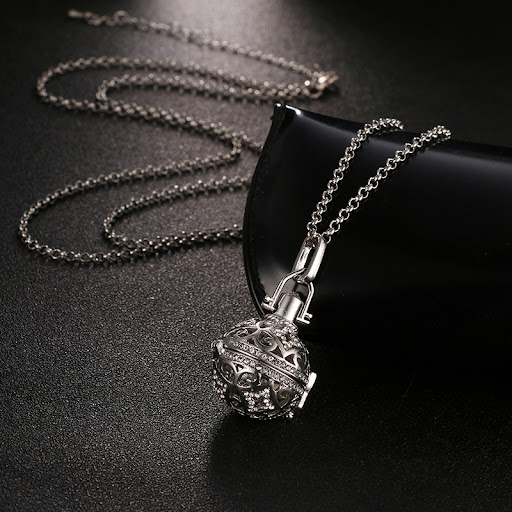 Title 7, Heart Shaped Wing with Drill Hollow Pendant, a ...