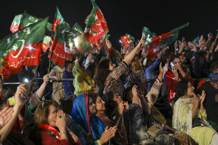 Supporters of the Pakistan Tehreek-e-Insaf party attend a rally in support of Pakistani Prime Minister Imran Khan in Islamabad, Pakistan, on April 5 2022. Picture: BLOOMBERG/ASAD ZAIDI